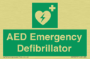 green-background-with-white-text-and-heart-defibrillator-symbol--white-cross-and~